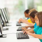 21184999 – group elementary school students in computer class